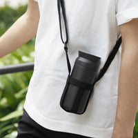 man carries kinto travel tumbler in black